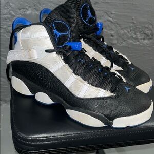 Air Jordan Black and White Sneakers with Blue Accents